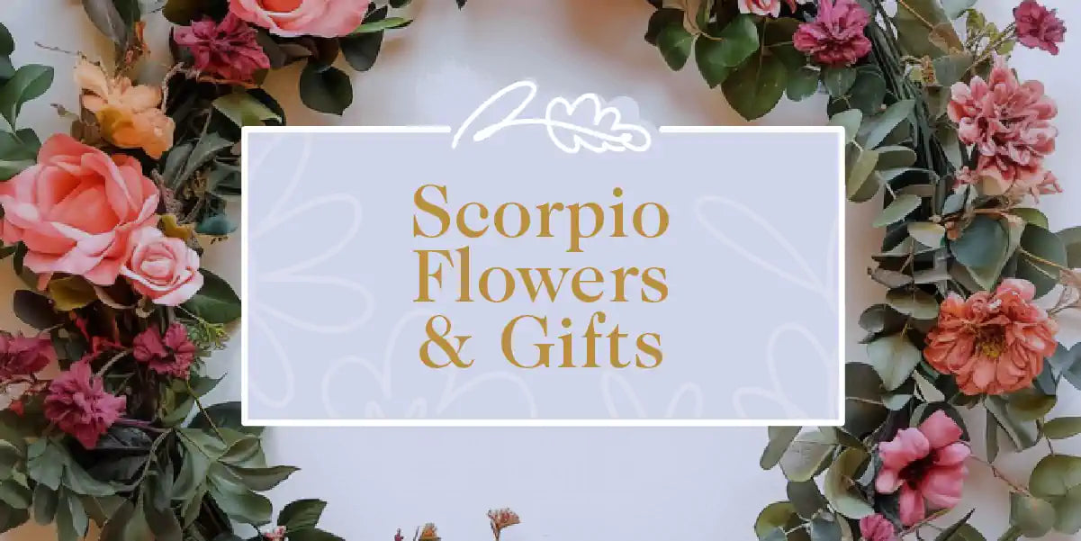 A lovely wreath made of pink and red flowers, ideal for gifting to a Scorpio. Fabulous Flowers and Gifts - Scorpio Flowers & Gifts