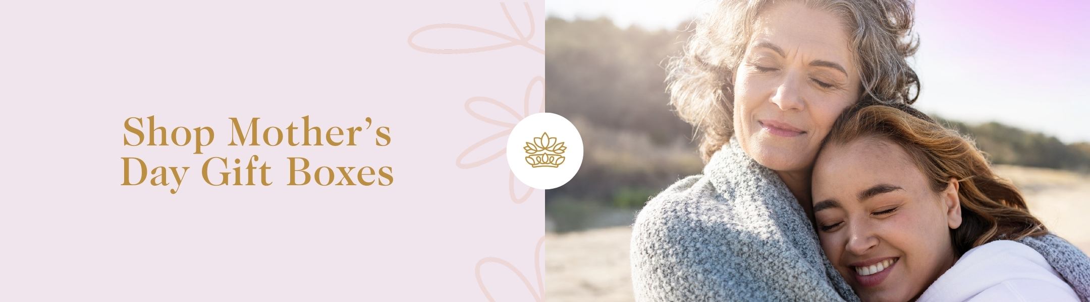 Shop Mother’s Day Gift Boxes banner with warm embrace between mum and daughter, pastel tones and elegant gold text.