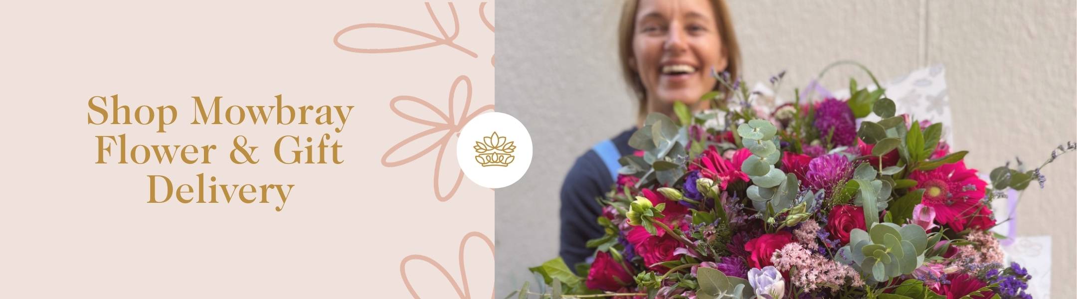 Shop Mowbray Flower & Gift Delivery - smiling florist holding large bouquet with eucalyptus, gerberas, roses, and seasonal blooms.