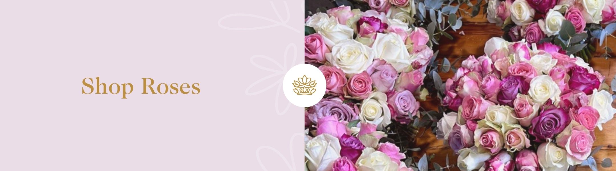 Shop Roses - Fabulous Flowers and Gifts featuring pink, cream and lavender rose bouquets arranged on a wooden florist table.