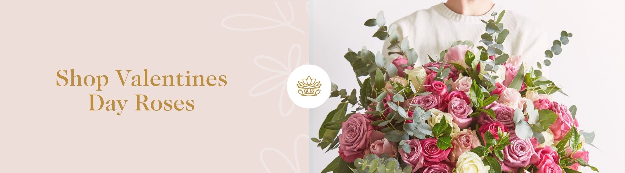 Shop Valentines Day Roses - Fabulous Flowers and Gifts with person holding large bouquet of pink, red and cream roses and foliage.