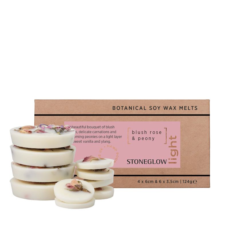 Stack of botanical soy wax melts with packaging labeled 'Blush Rose & Peony' by Stoneglow on a white background.