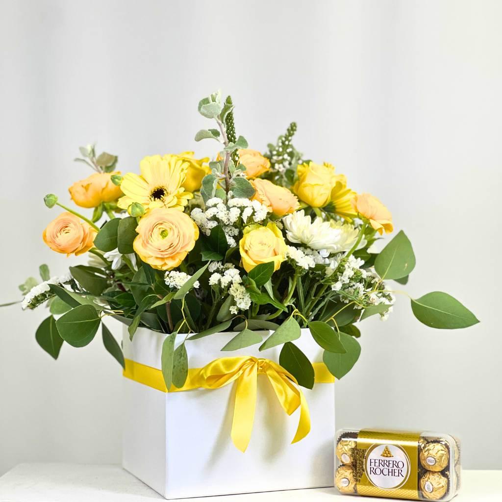 Delicious 16-piece Gift Box from Ferrero Rocher Gift Box with Sundance Flower Arrangement with yellow and white flowers - Fabulous Flowers