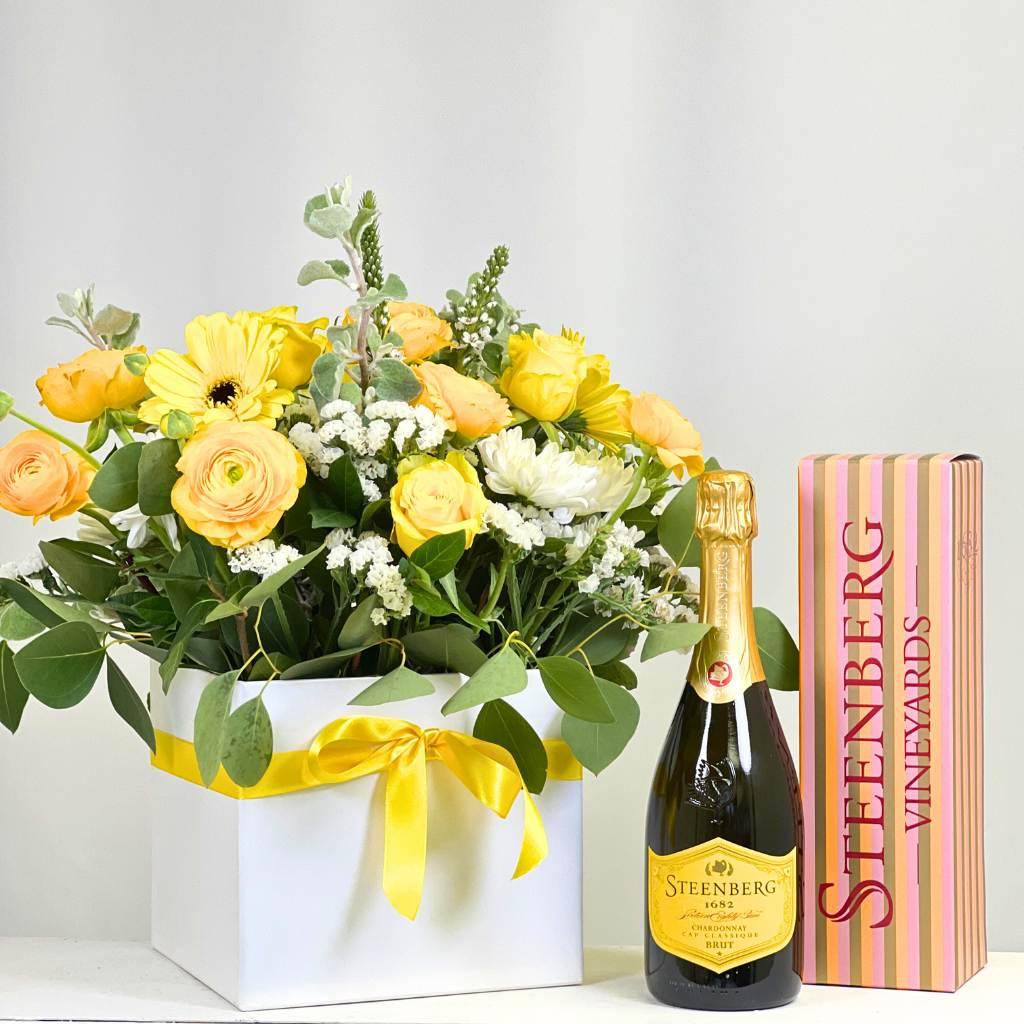 Steenberg 1682 Chardonnay paired with Sundance Bloom Box arranged by local florists with seasonal white and yellow flowers with roses and gerberas - Fabulous Flowers