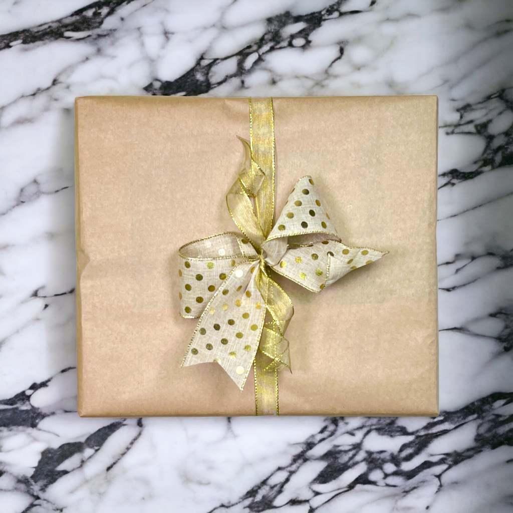 Christmas gift box wrapping with kraft paper and golden ribbon - Fabulous Gifts