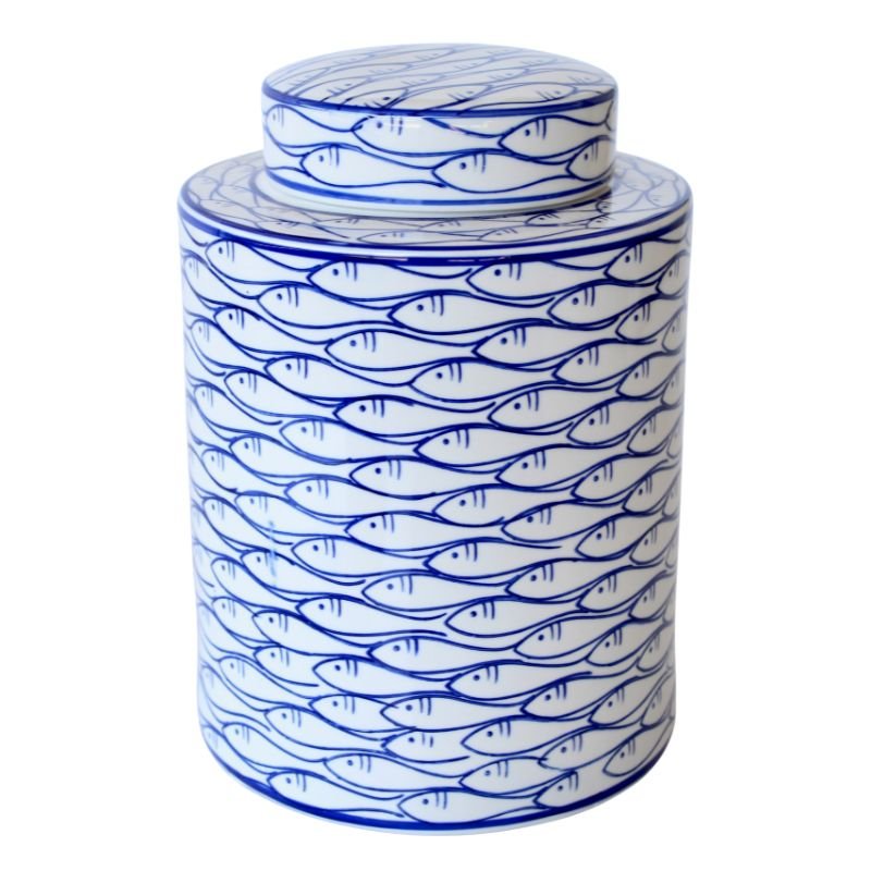 Ceramic jar with blue fish pattern on a white background