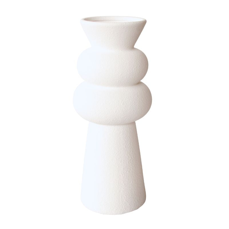 White ceramic vase with a modern design on a white background