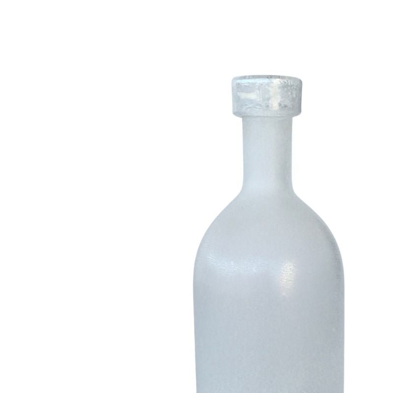 Close up on white transparent bottle vase

