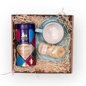 Golden-baked gourmet biscuits paired with Royal Tea Ceylon and blue cup and saucer - Fabulous Flowers and Gifts