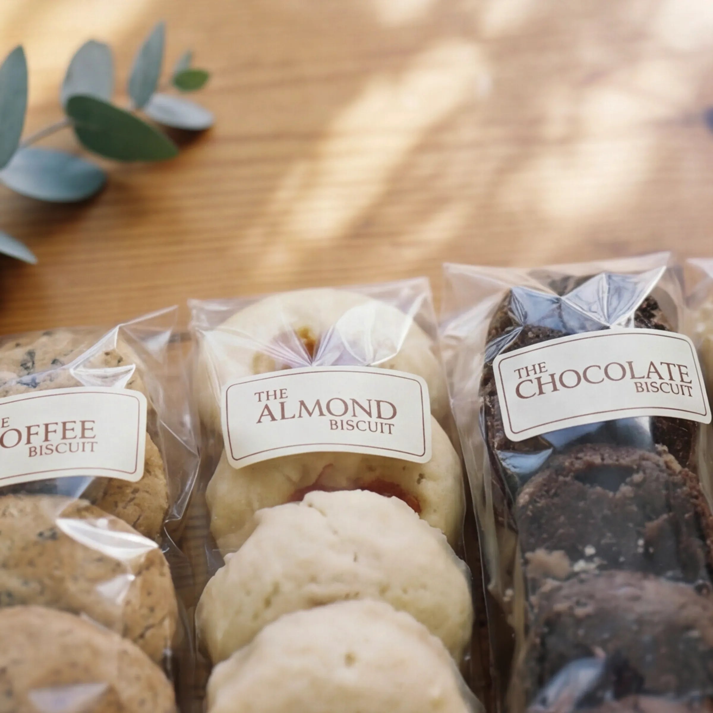 Close-up of Coffee, Almond and Chocolate Biscuit sleeves from The Best Biscuits gift box by Fabulous Flowers