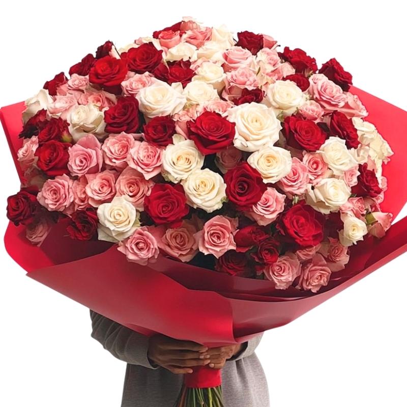 Oversized 500-rose bouquet in red, cerise, blush and white roses, wrapped in deep red paper
