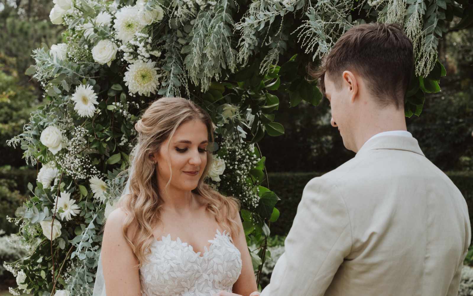 About to be married couple celebrating wedding vows with wedding flowers - Fabulous Flowers