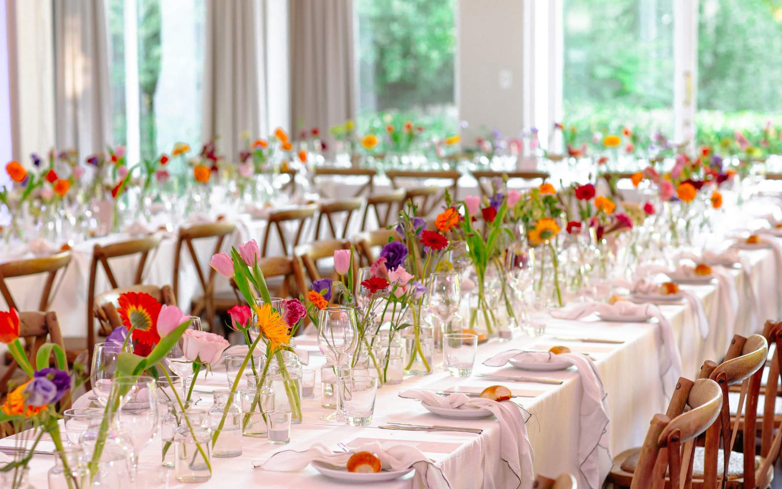 Wedding decor at Cape Town Wedding Venue, colourful flowers in vases - Fabulous Flowers