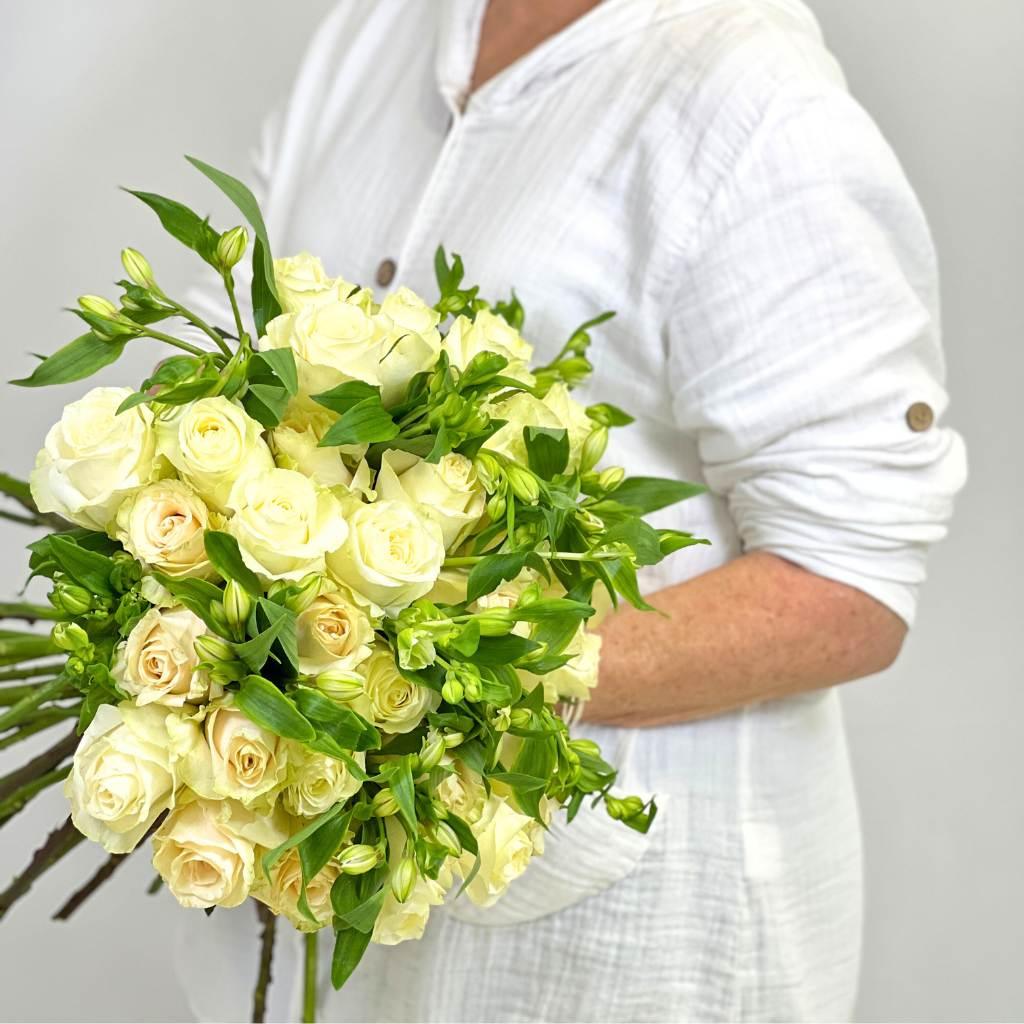 Local florist holding White Oasis Rose Bouquet 30 white roses and 10 alstroemeria - Fabulous Flowers