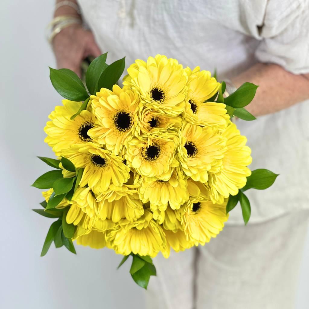 Yellow Gerbera Daisy Bouquet with greenery Wrapped and delivered by Fabulous Flowers