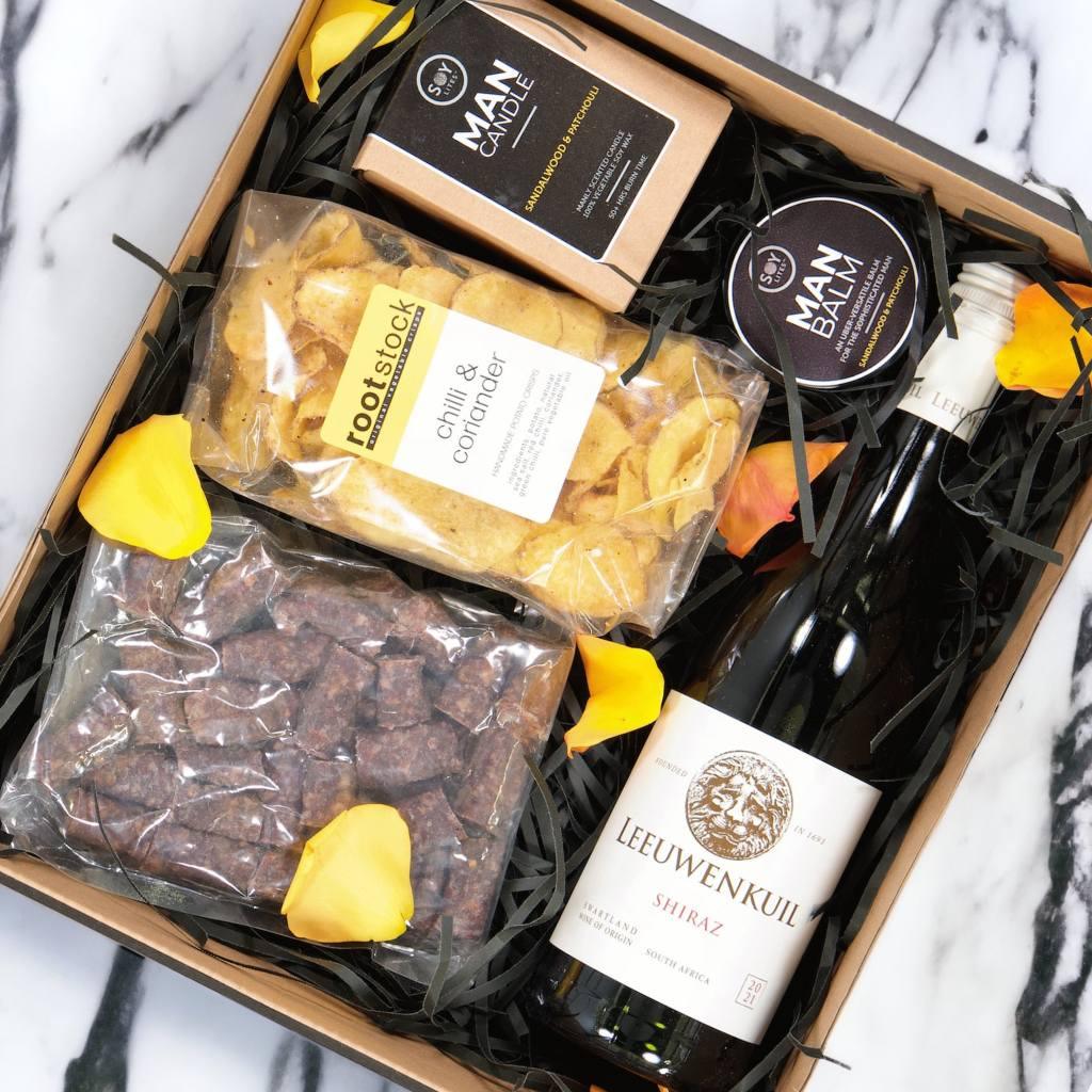 Yours Truly Hamper, the perfect gift for men in South Africa with Leeuwenkuil red wine, Soy Lites Man Candle, Soy Lites Man Balm, Droe Words and Crisps delivered nationwide - Fabulous Flowers