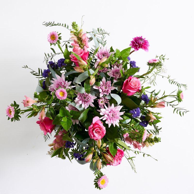 Beautiful flower arrangement with pink roses, alstroemeria, aster, purple statice and chrysanthemums | Fabulous Flowers Cape Town Florist