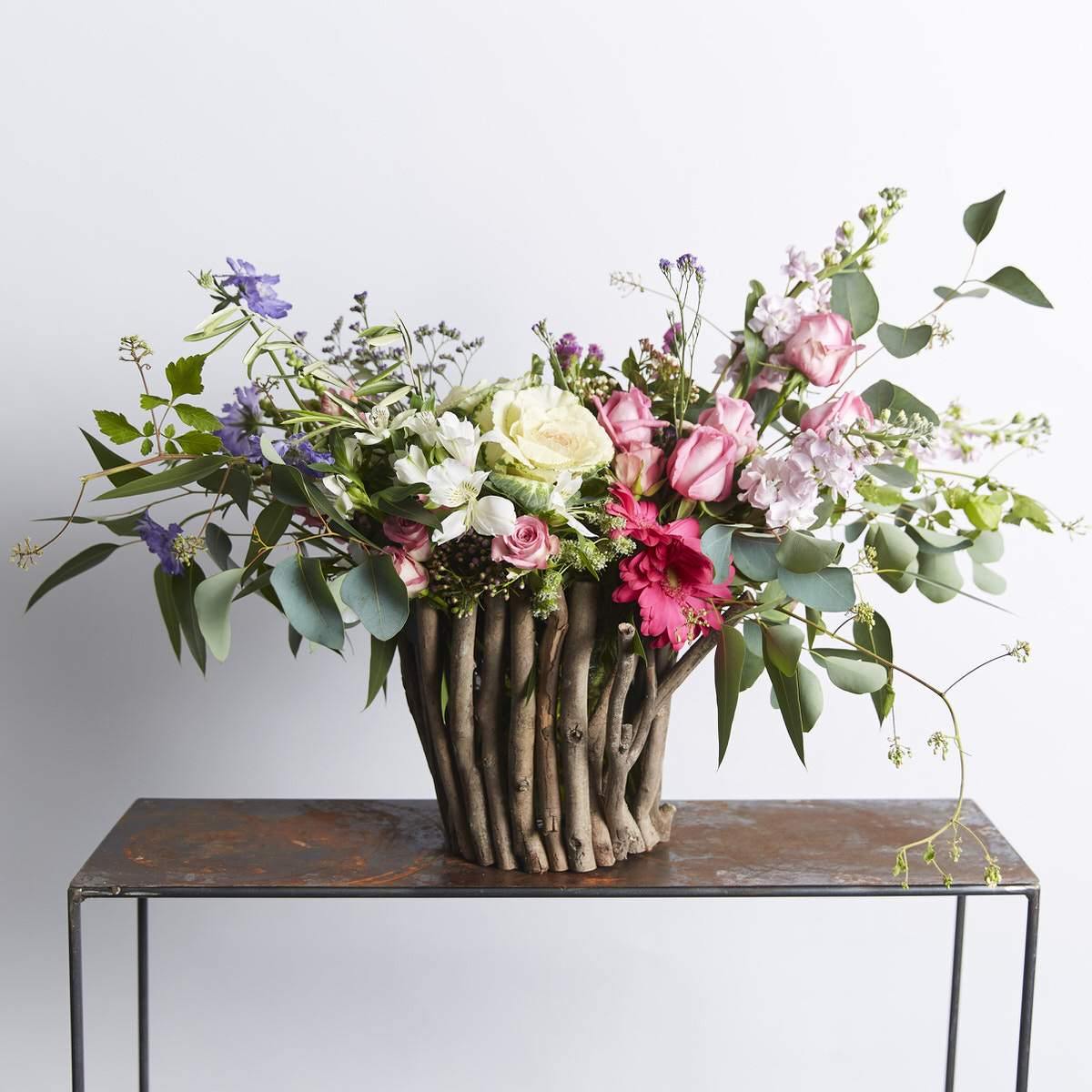 Elegant, gerberas, ornamental kale, stocks in the Bloom Blush Flower Arrangement