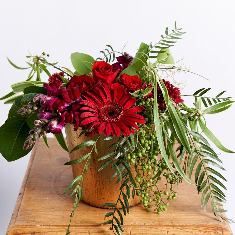 Red rose, gerber, marron snapdragons and  greenery in gold container | Fabulous Flowers