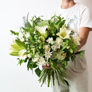 The ingredients of this timeless classic include:  St Joseph Lilies Roses Gerberas Snapdragons Chrysanthemums Alstromeria Lace Rich greenery from Fabulous Flowers