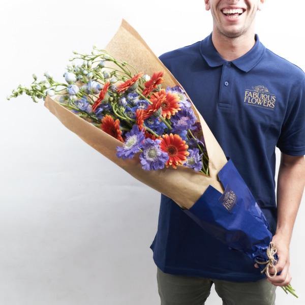 Orange_Gerberas_Blue_Delphiniums_Happy_Birthday_Flowers Fabulous Flowers.