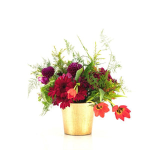 Red gerberas and tulips with snapdragons in a gold container by Fabulous Flowers