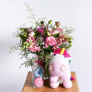 Moms Little Princess gift is filled with Unicorn teddy bear Bespoke pink and white flowers Harck & Heart Colourful love doughnuts | Fabulous Flowers 