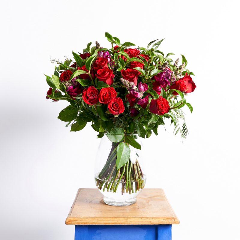 36 red roses 10 snapdragons Lush Greenery Glass Vase | Fabulous Flowers