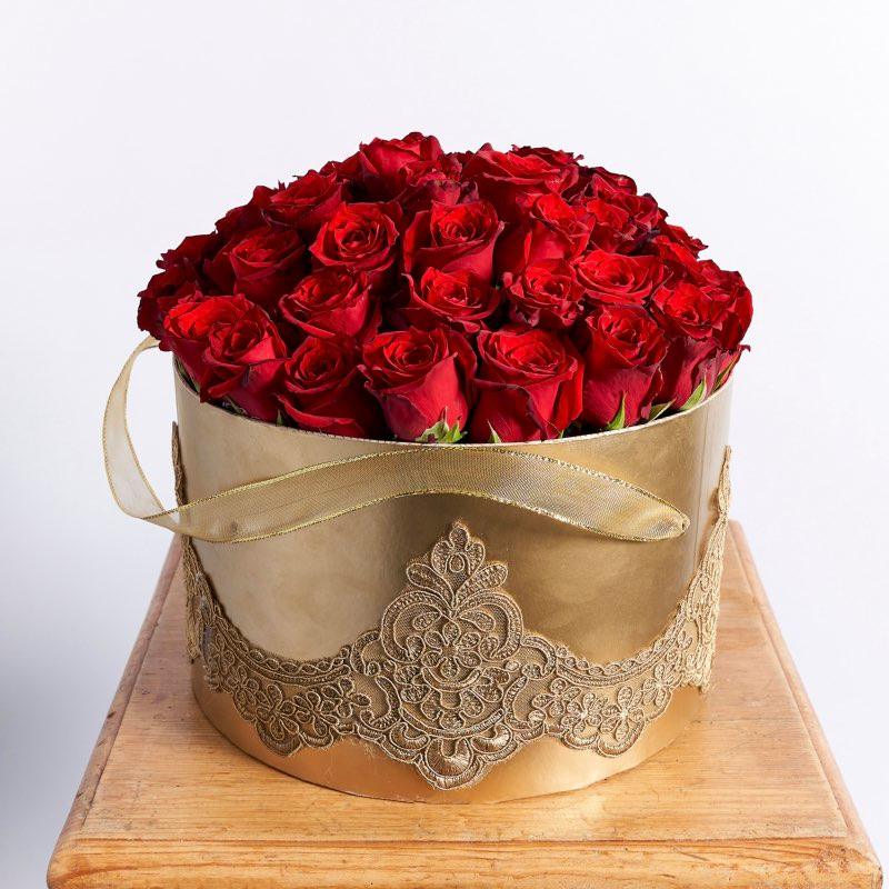 Vibrant red roses in golden lace box | Fabulous Flowers