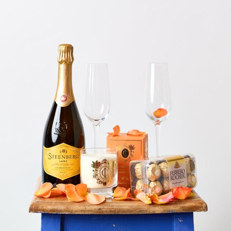 Order this luxe gift hamper with Steenberg Chardonnay Cap Classique, Cape Island Candle and delicious Ferrero Rocher chocolates