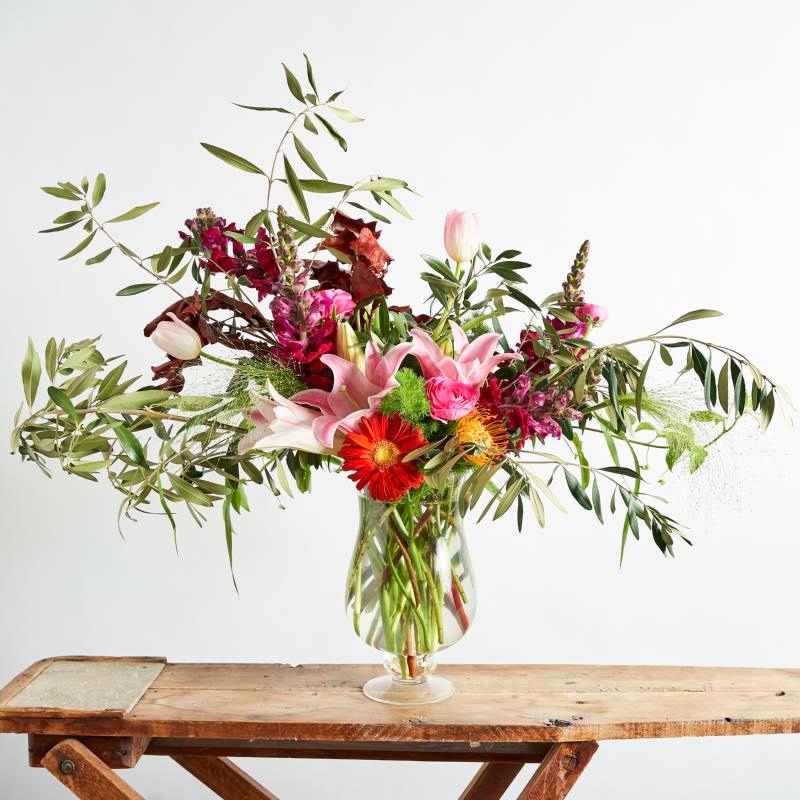 Vogue Flower Arrangement styled in a modern fashion with maroon snapdragons, lilies, pincushions and gerberas | Fabulous Flowers Florist Nearby
