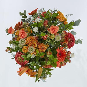 Bright Sunshine in a Vase includes Gerberas Lilies Roses Chrysanthemums Seasonal orange blooms Greenery - Fabulous Flowers Cape Town Flower Delivery