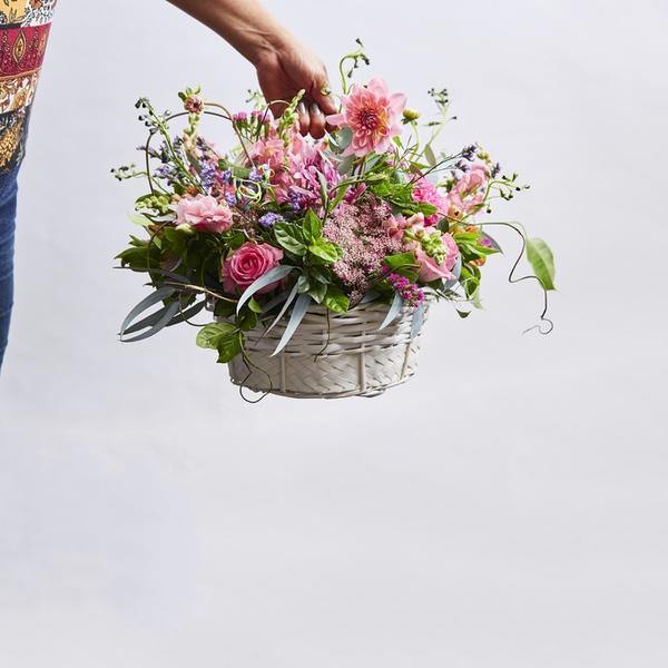Pink flowers in Country Flowers Wooden Basket arrangement