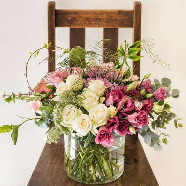 Elegant white and pink rose in the Creative Poetry flower arrangement